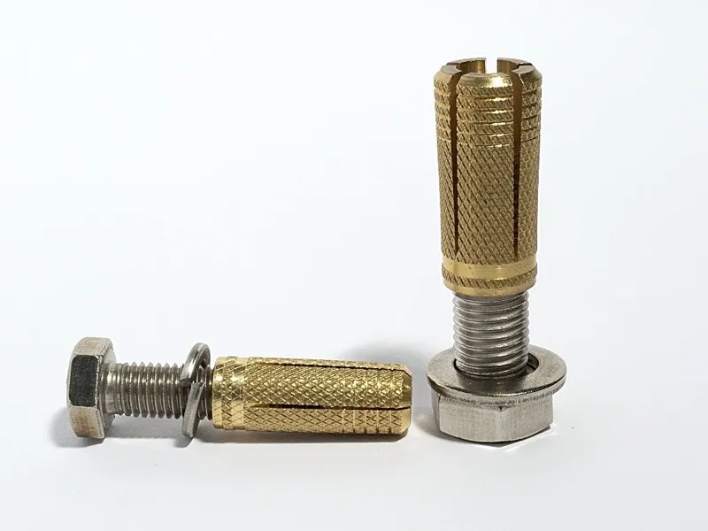 Brass expansion anchors with a stainless steel bolt and washer